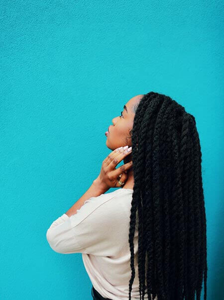 Black woman with twists professional hairstyle