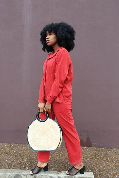 Black woman with Natural Curly Fro professional hairstyle