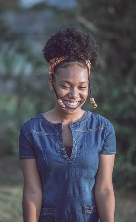 Black woman with High Puff with Braids natural professional hairstyle