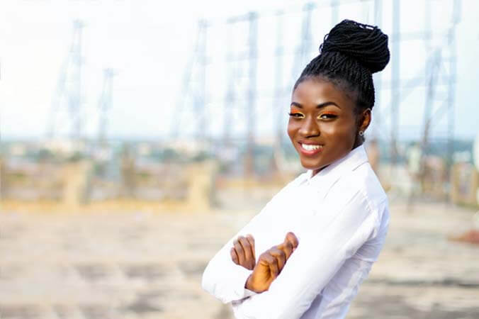 Black woman with Individual Braids professional hairstyle 