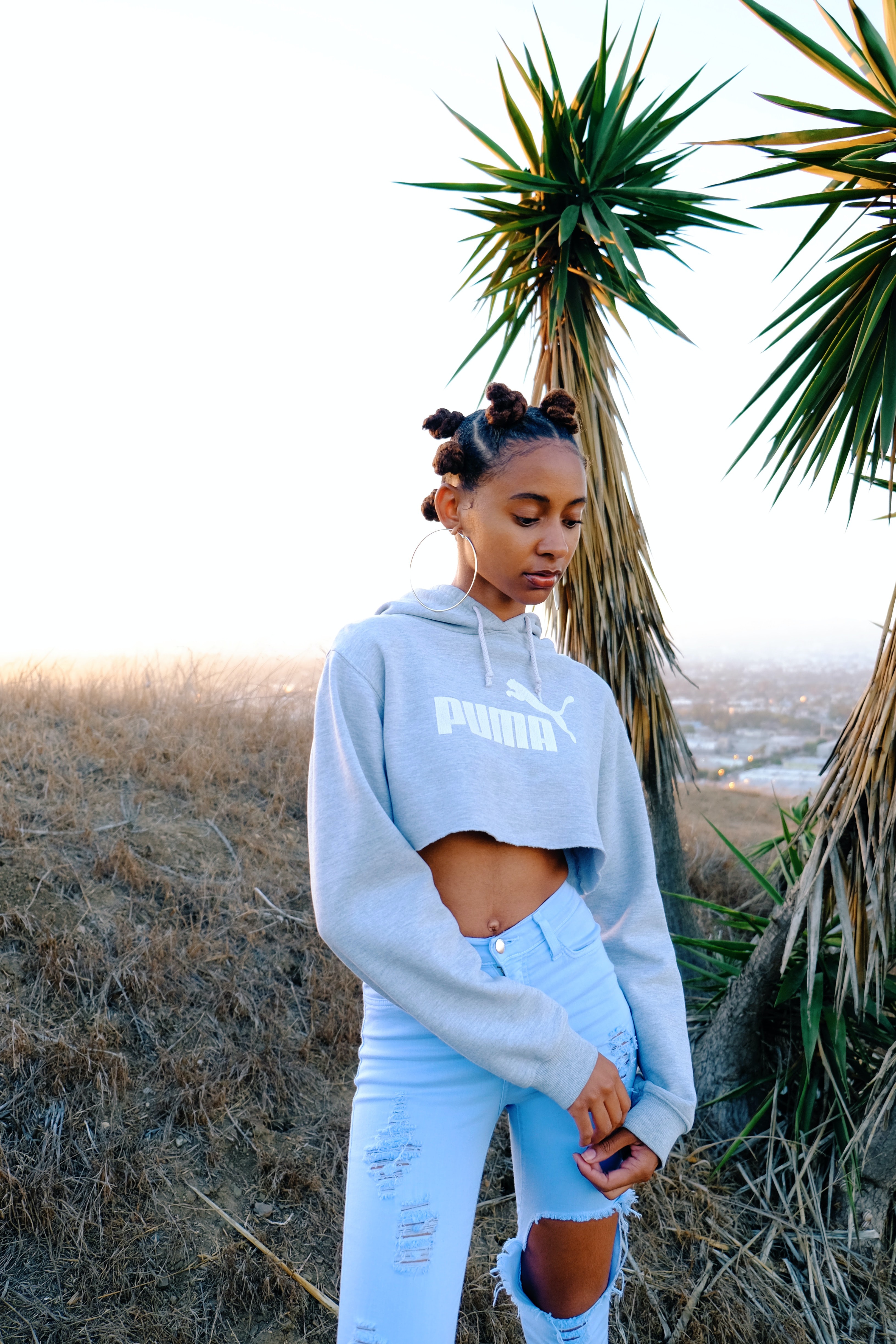 Black woman with bantu knots professional hairstyle