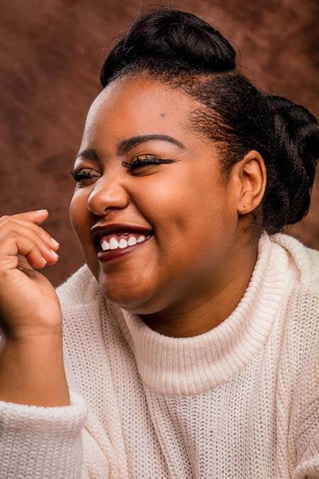 Black woman with Sleek Bun professional hairstyle